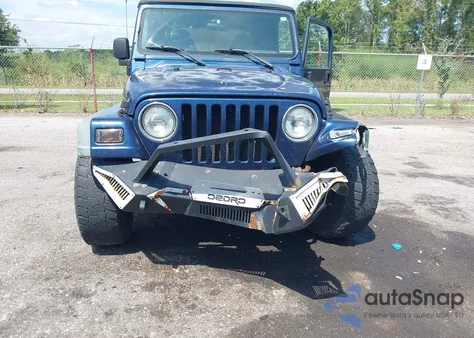 2000 Jeep Wrangler Sport from USA, damaged, VIN 1J4FA49S1YP772748